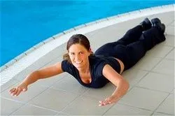 Woman performing a back-strengthening exercise